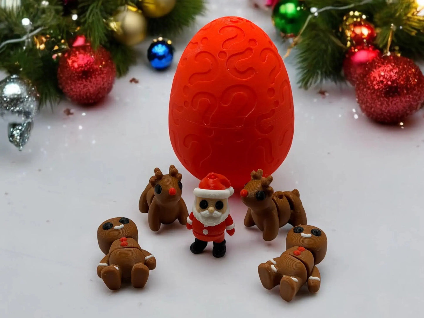 Christmas mystery egg with holiday-themed mini toys and festive packaging