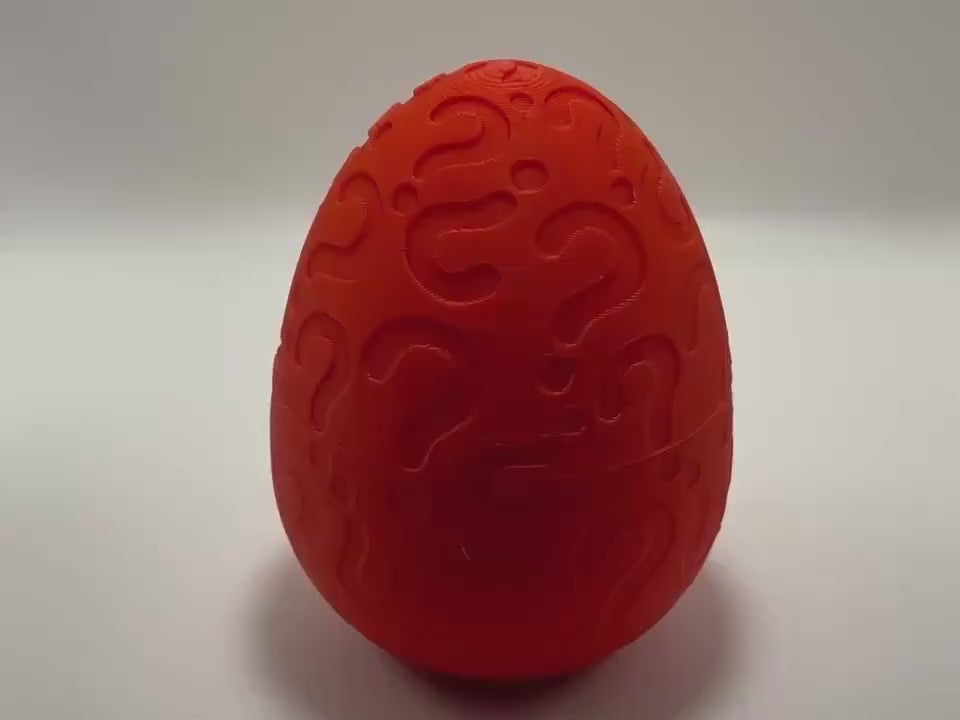 Christmas mystery egg with holiday-themed mini toys and festive packaging